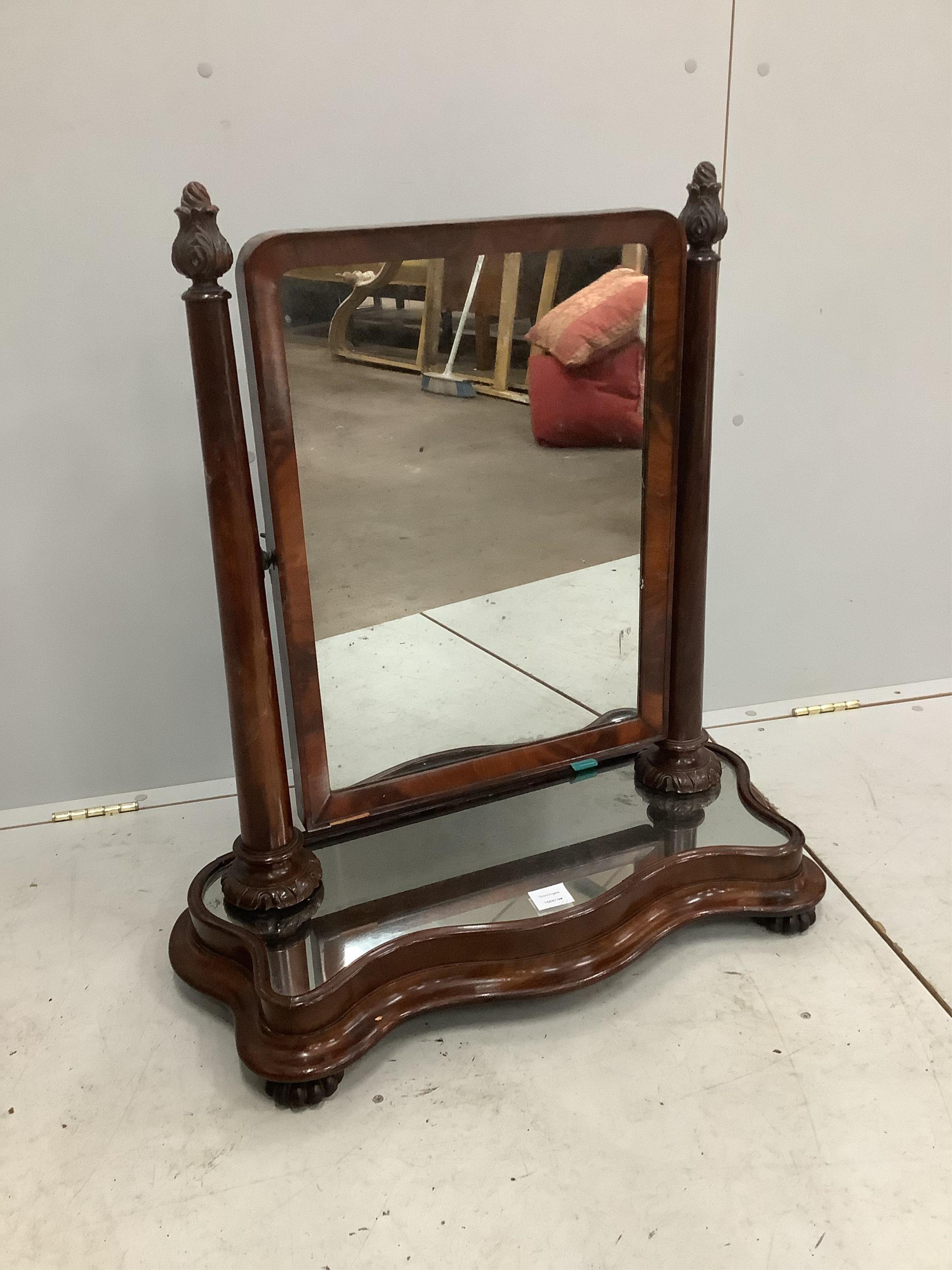 A Victorian mahogany toilet mirror, with an unusual mirrored platform base, width 72cm, depth 30cm, height 80cm. Condition - fair